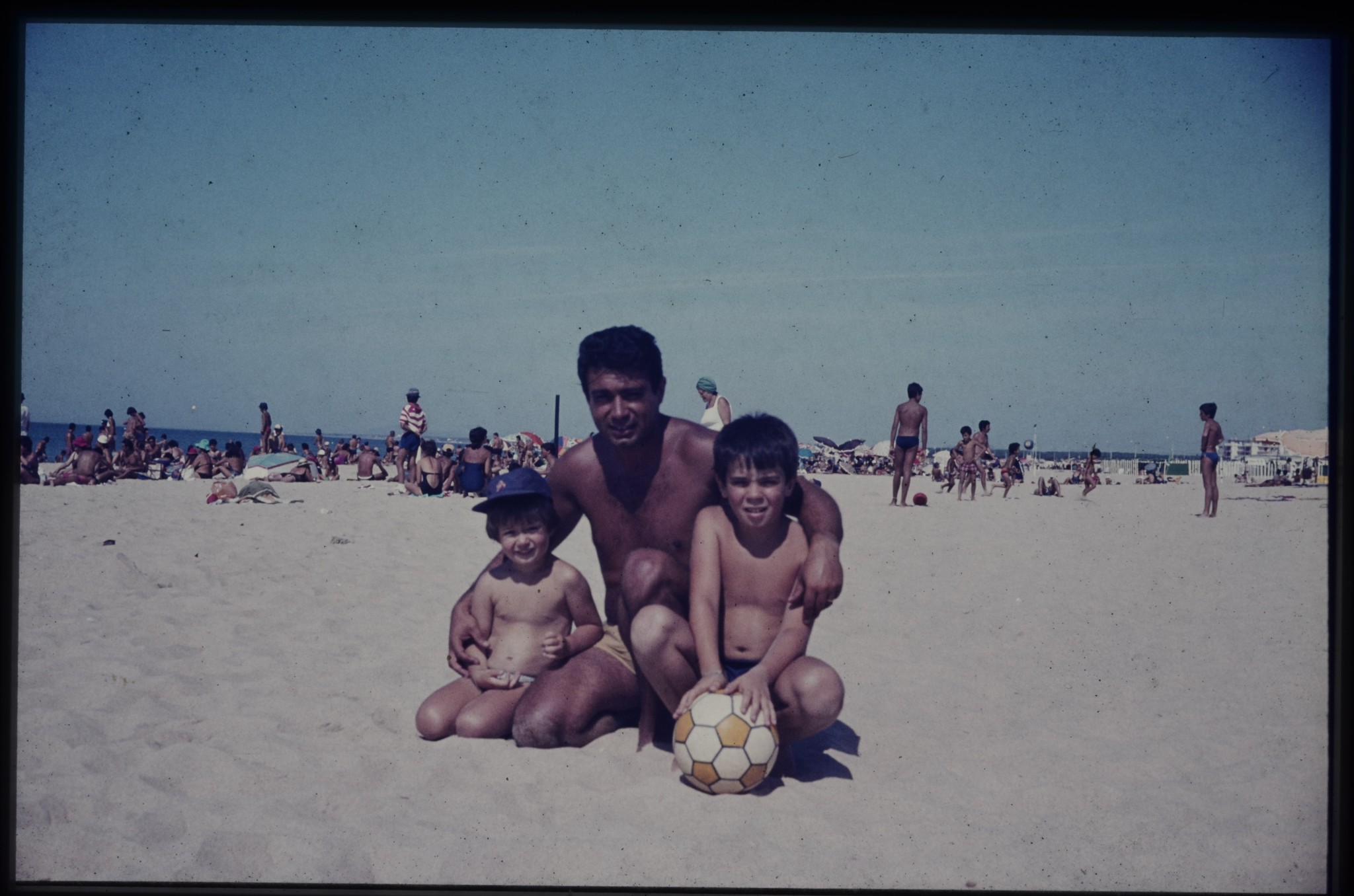 My Father, with wee little me on his right and my brother, to his left, early 80s